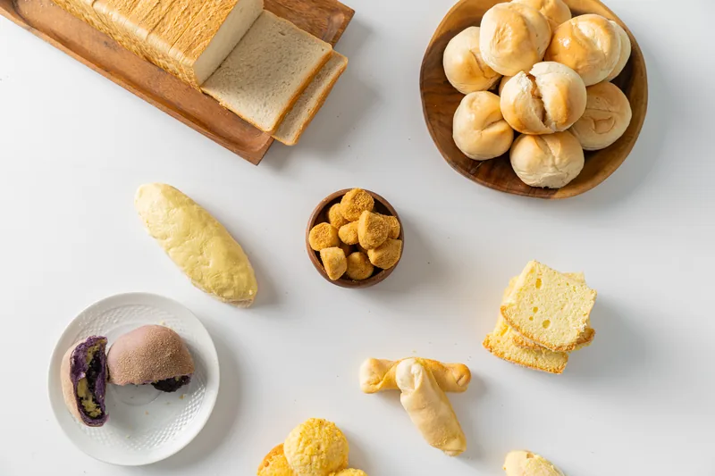 An overhead spread of the LA Bakeshop range on white, boards, bowls and plates arranged loosely.